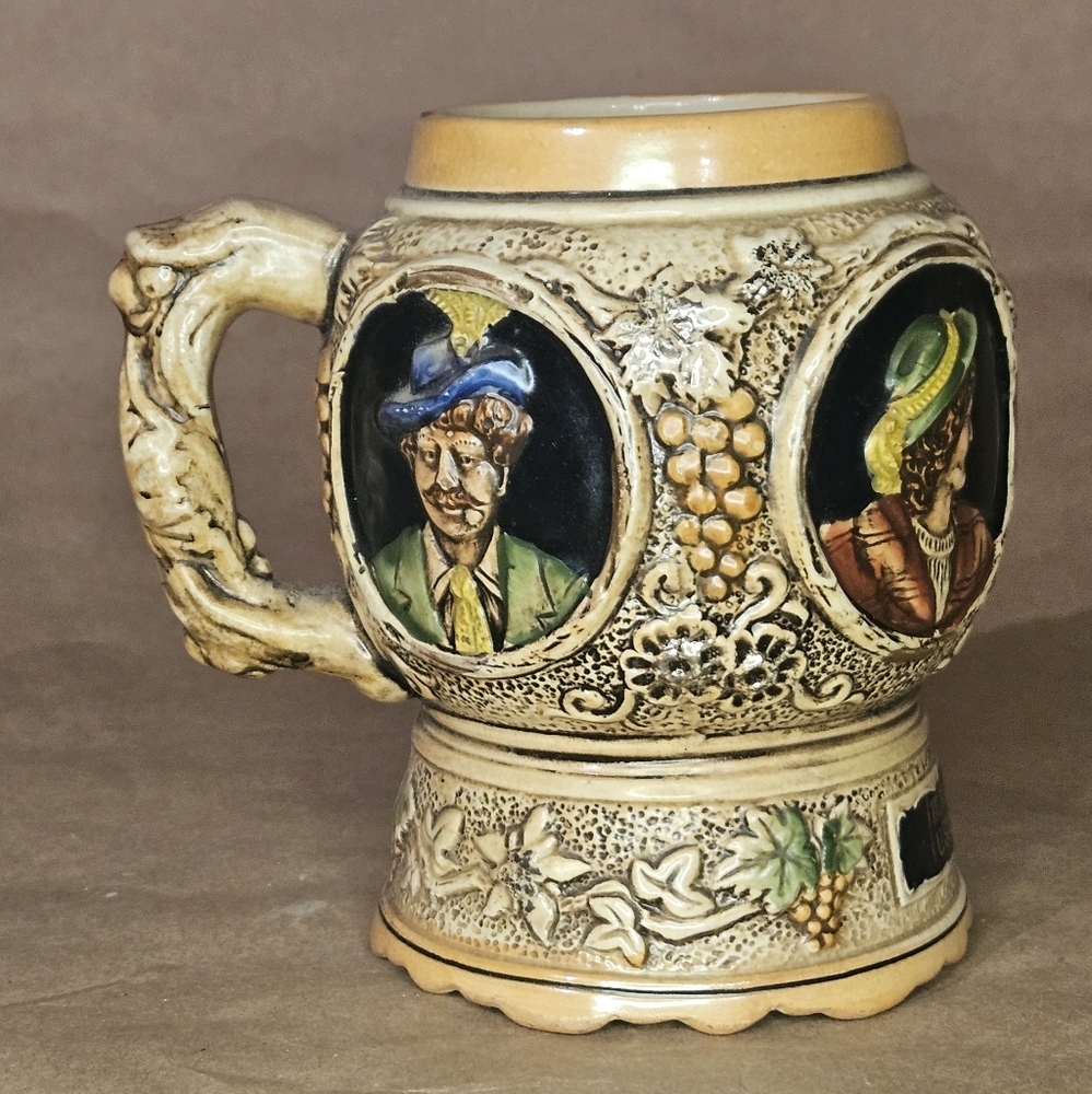 Vintage Ceramic Mug with Artistic Portraits